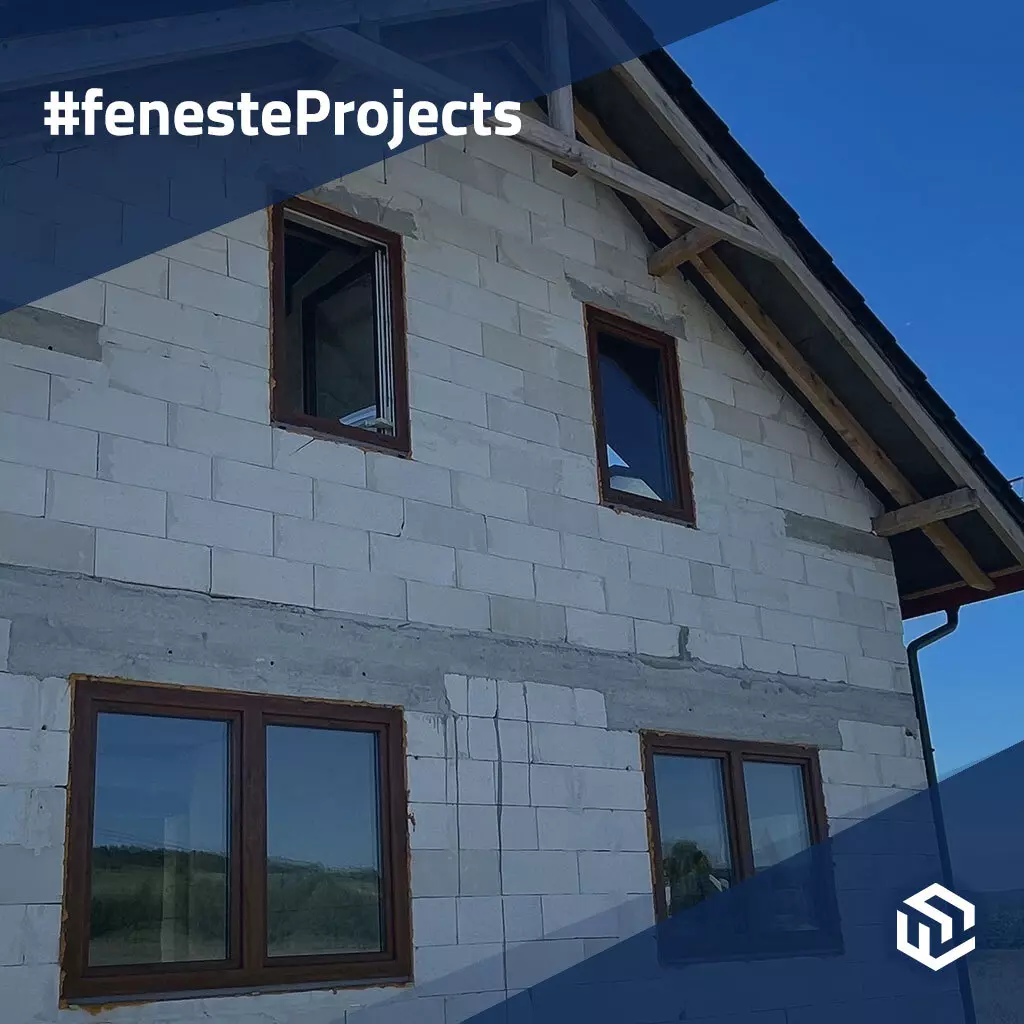 A house on the prairie with golden oak windows projects